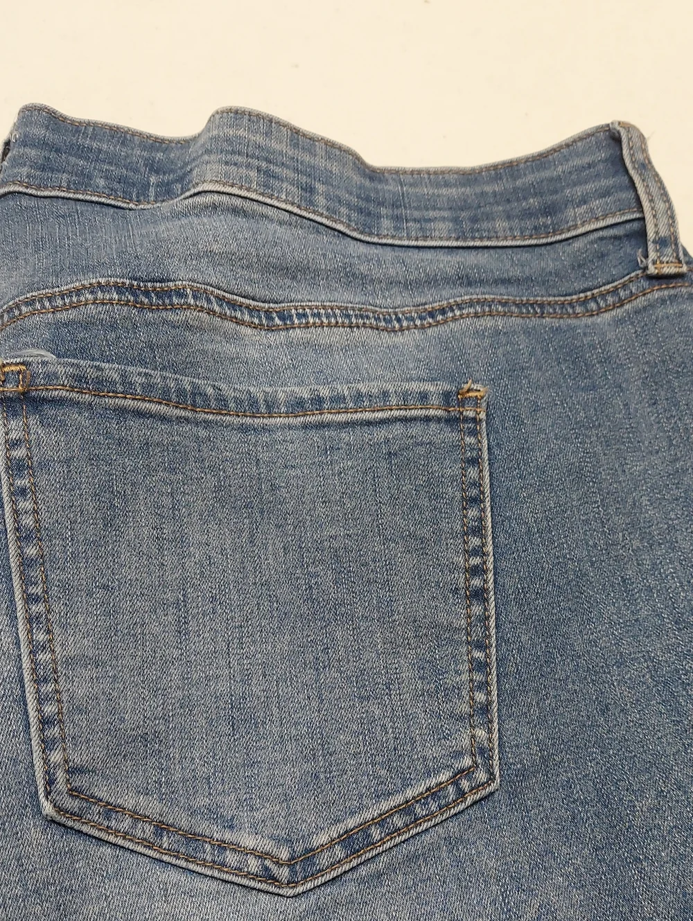 Wonderly Mid Rise 16W Skinny Jeans in Light Blue Wash